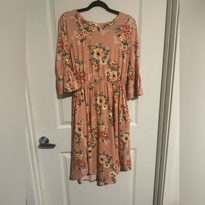 Reb and J peach floral dress. With mid bell sleeves and buttery soft fabric!